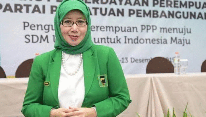 DR. Hj. Reni Marlinawati