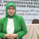 DR. Hj. Reni Marlinawati